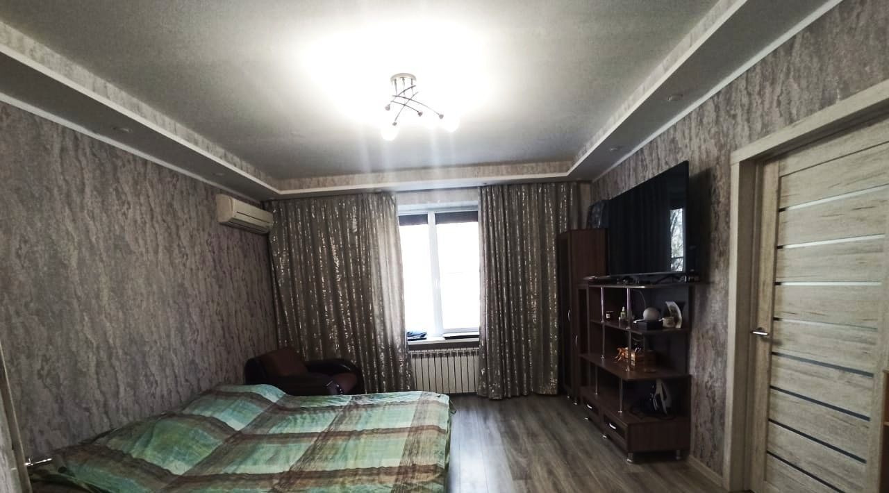 квартира г Волгоград р-н Красноармейский ул Саушинская 20 фото 11