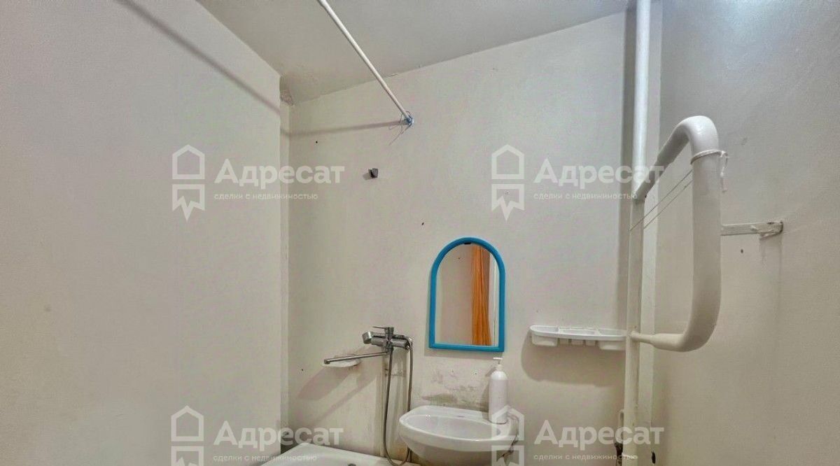 квартира г Волгоград р-н Дзержинский ул Шекснинская 32 фото 9