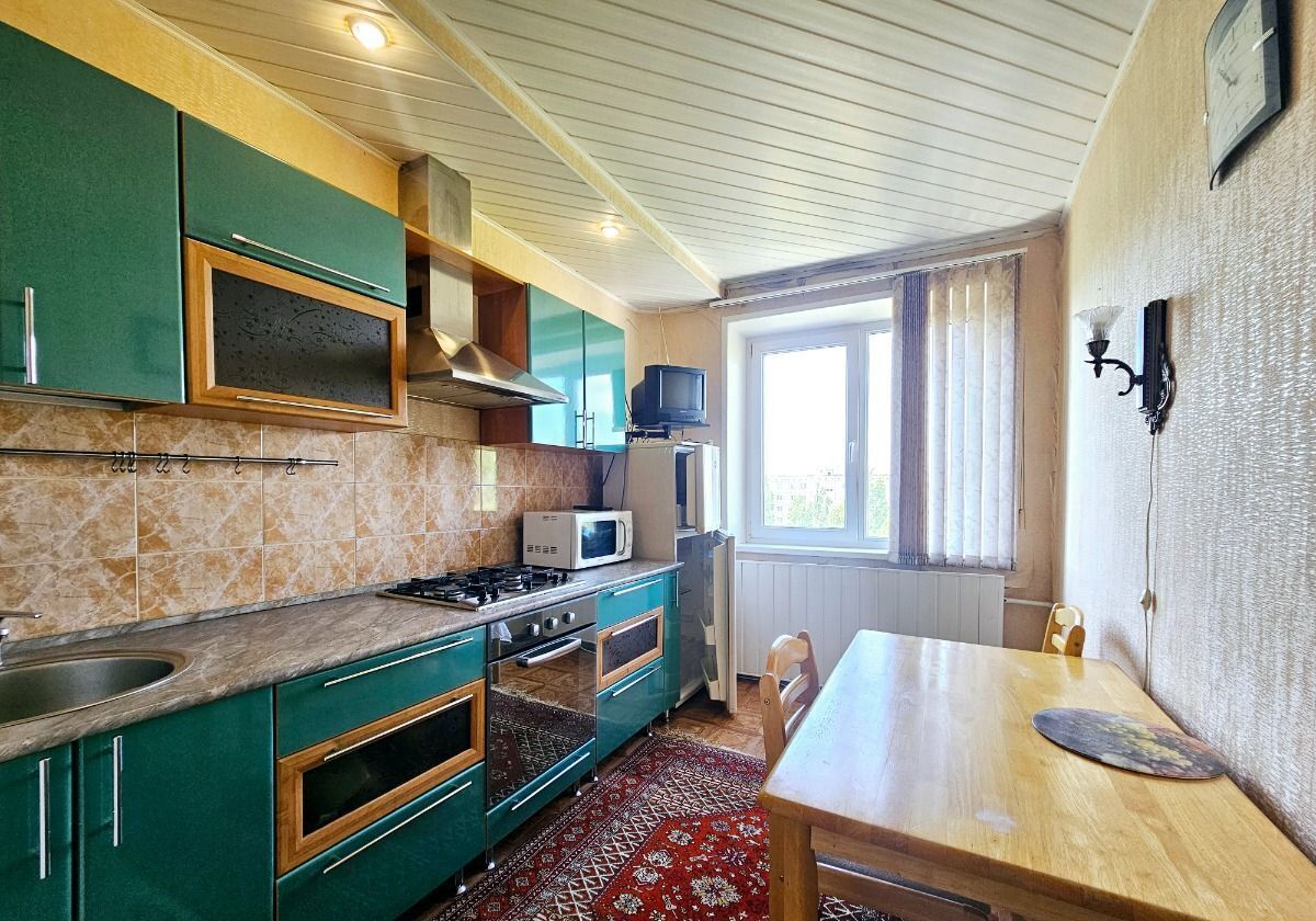 квартира г Волгоград р-н Тракторозаводский ул им. Менжинского 19 фото 1