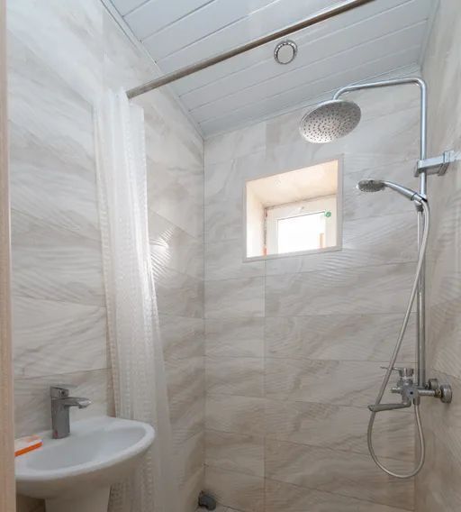 дом г Махачкала р-н Кировский микрорайон Караман-7 ул. Агамедова, 7 фото 9